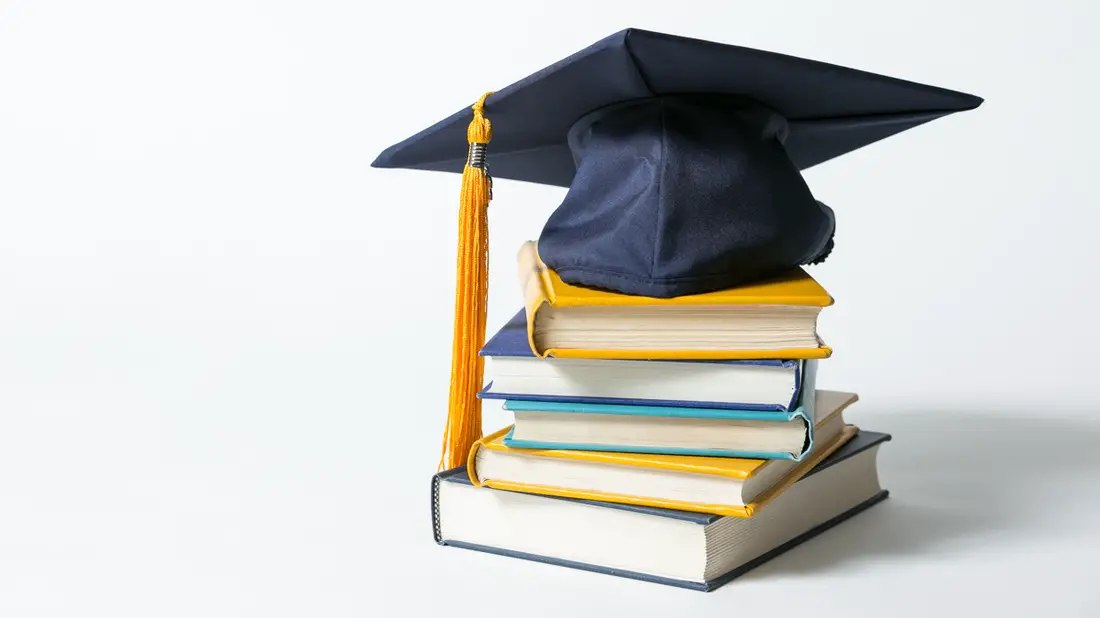 Graduation Cap with book