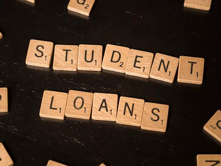how is a student loan different from a scholarship?